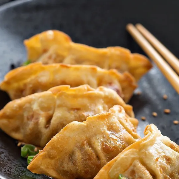 Golden pan-fried gyoza dumplings add-on